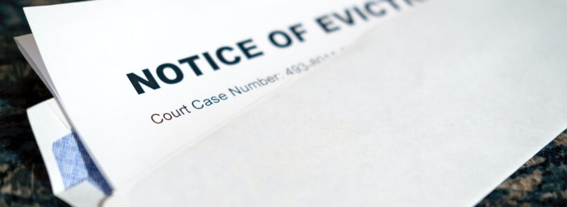 a close up of a piece of paper with a notice of eviction on it